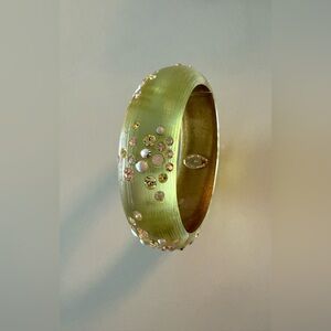 Begin The New Year With A Bangle. Alexis Bittar’s stunning, sparkling bangle.